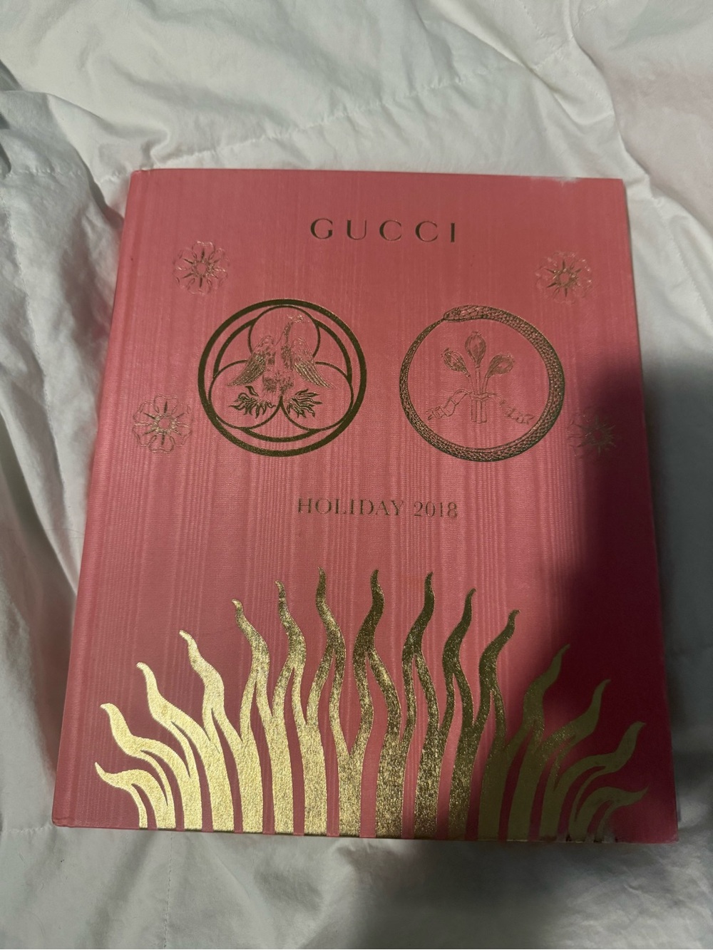 Gucci Pink Hardcover with Gold Foil Emblems